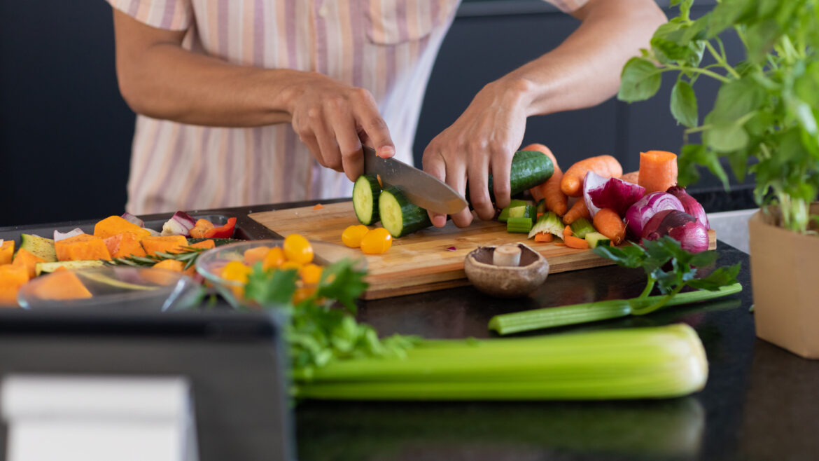 a person cutting vegetables