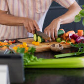 a person cutting vegetables