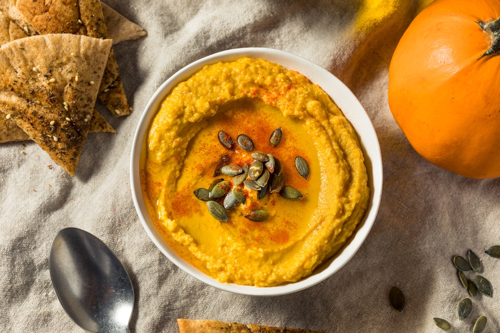Pumpkin Hummus With Toasted Pepitas and Pita Chips